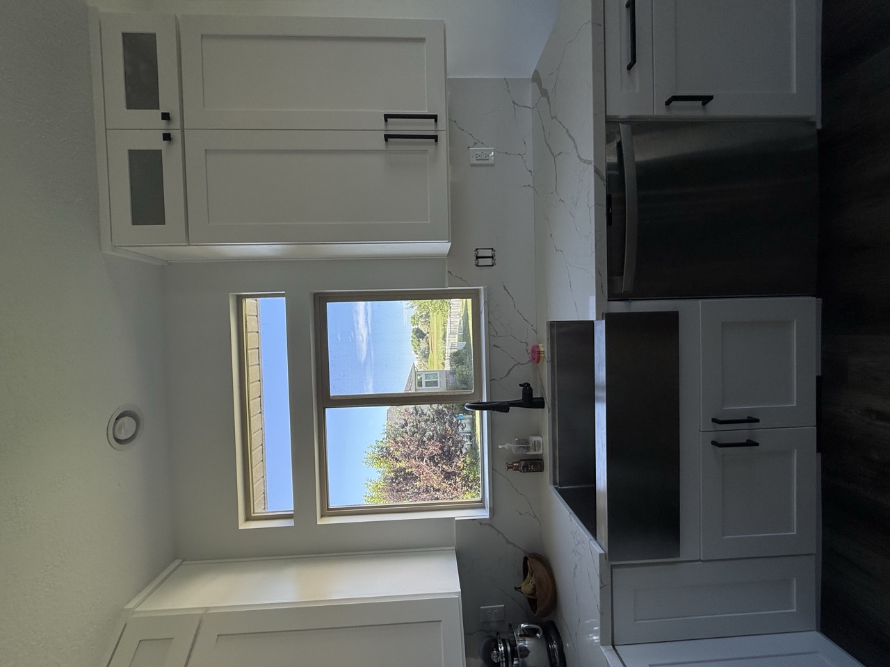 Modern kitchen alternate angle - after renovation by Salt City Cabinet