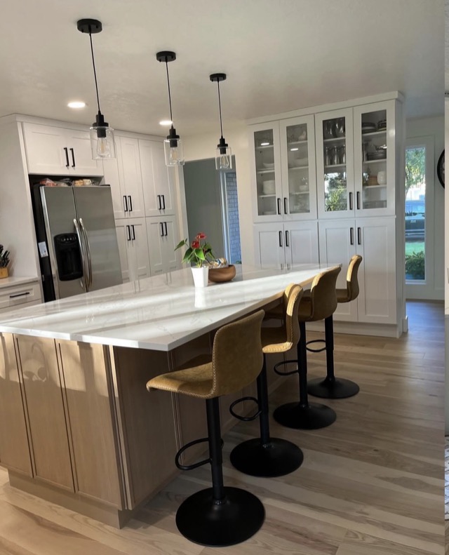 Kitchen renovation with new countertops and fixtures