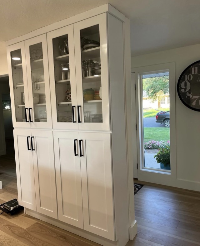 Custom cabinetry with brushed nickel hardware