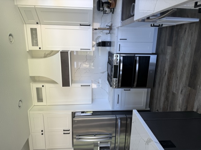 Kitchen renovation with new cabinetry and flooring