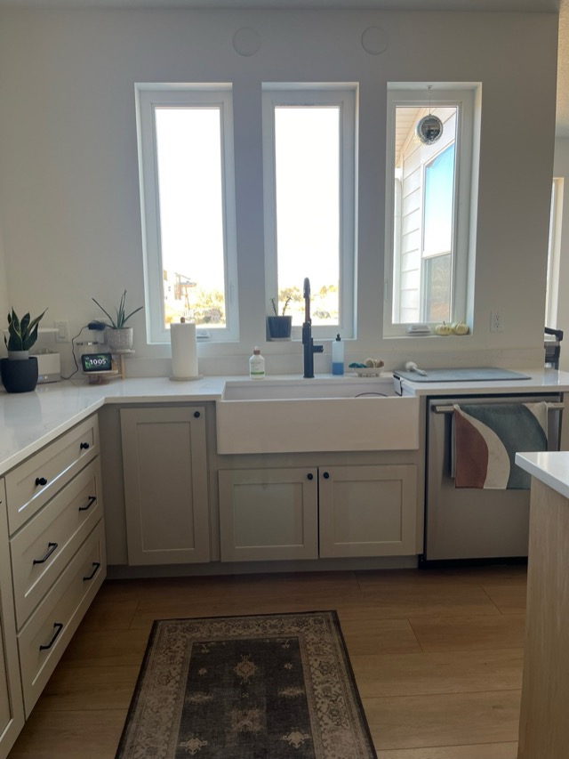 Completed kitchen with custom cabinets and stone counters